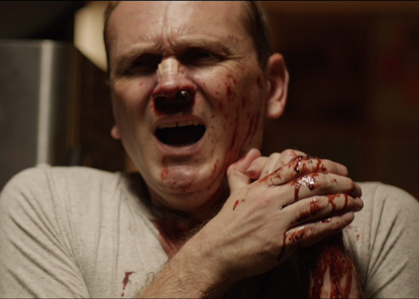 Film still from Cheap Thrills