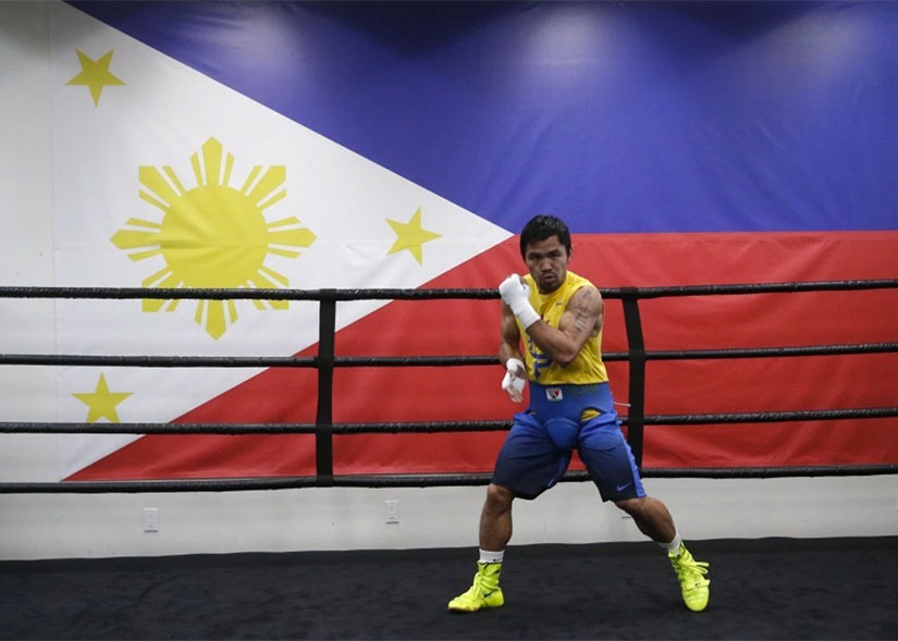 Manny Pacquiao in front of the Filipino Flag